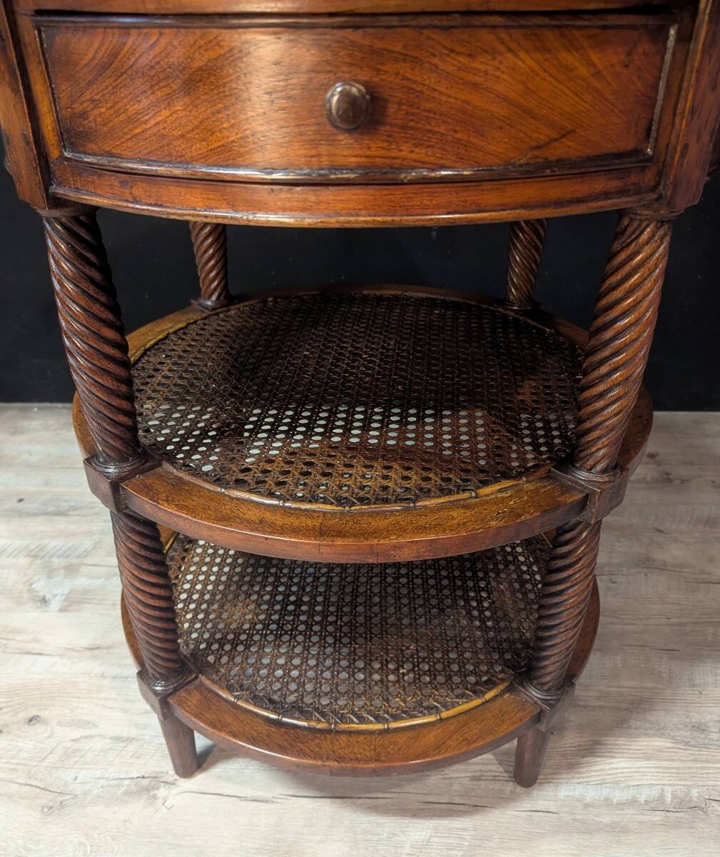 Pair of oval mahogany side tables with caned shelves – 19th century