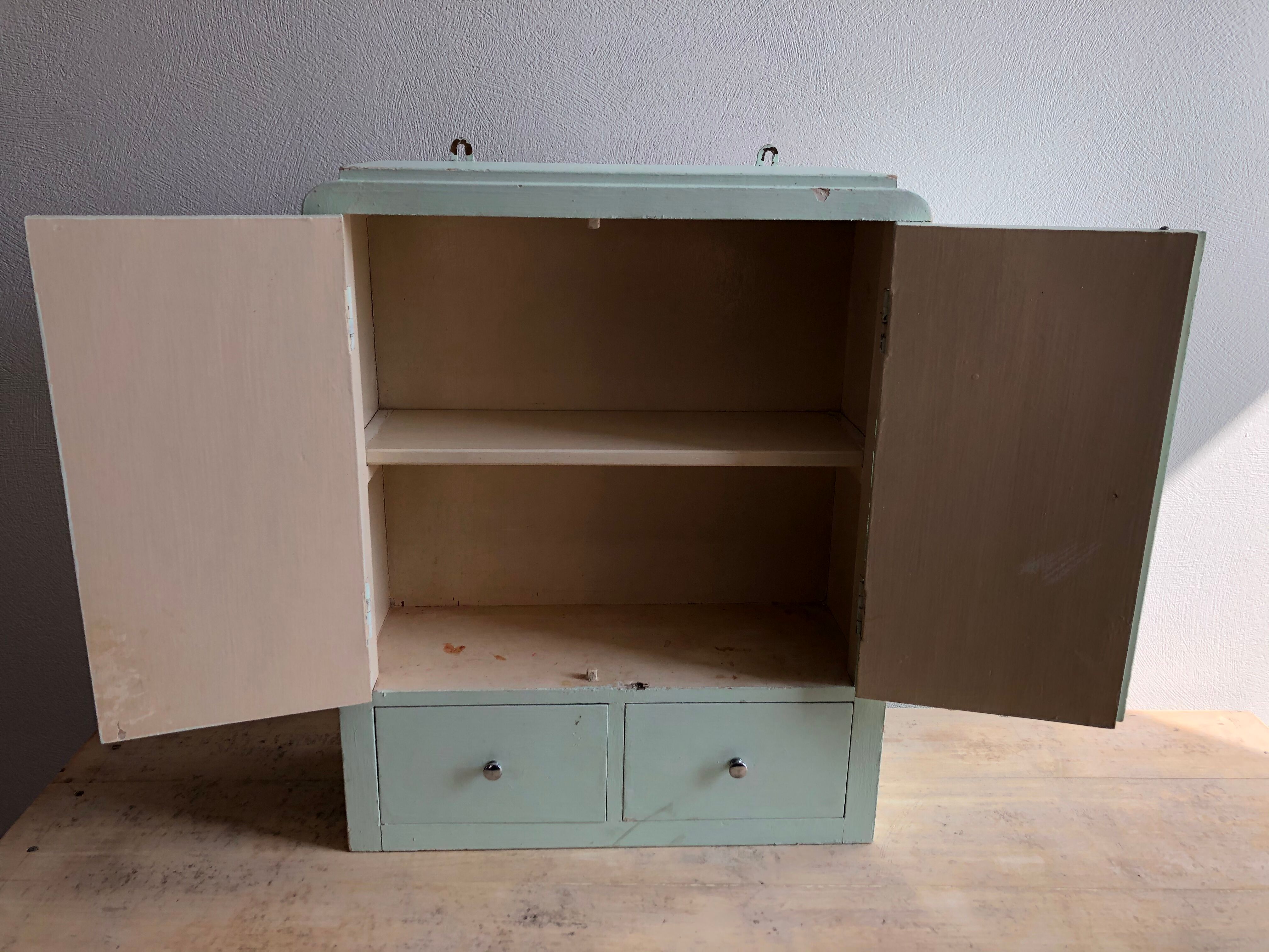 Patinated medicine cabinet