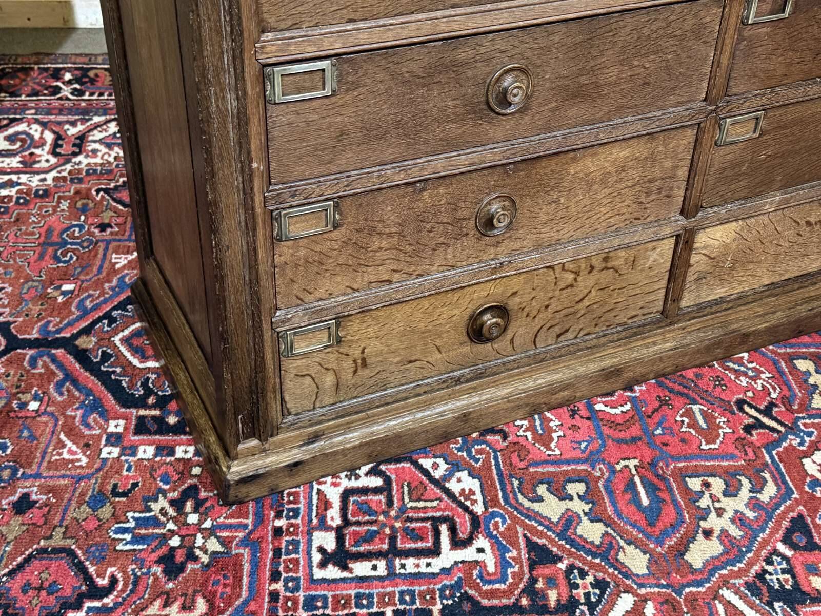 Notary's cabinet with 18 drawers in oak and fir from the early 20th century.