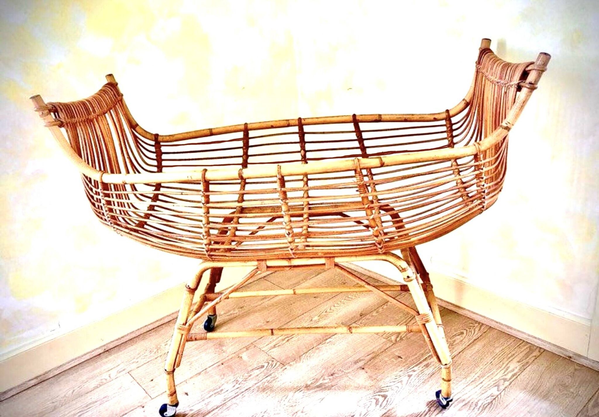Vintage rattan canoe cradle