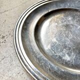 Round silver-plated metal dish monogrammed "MR"