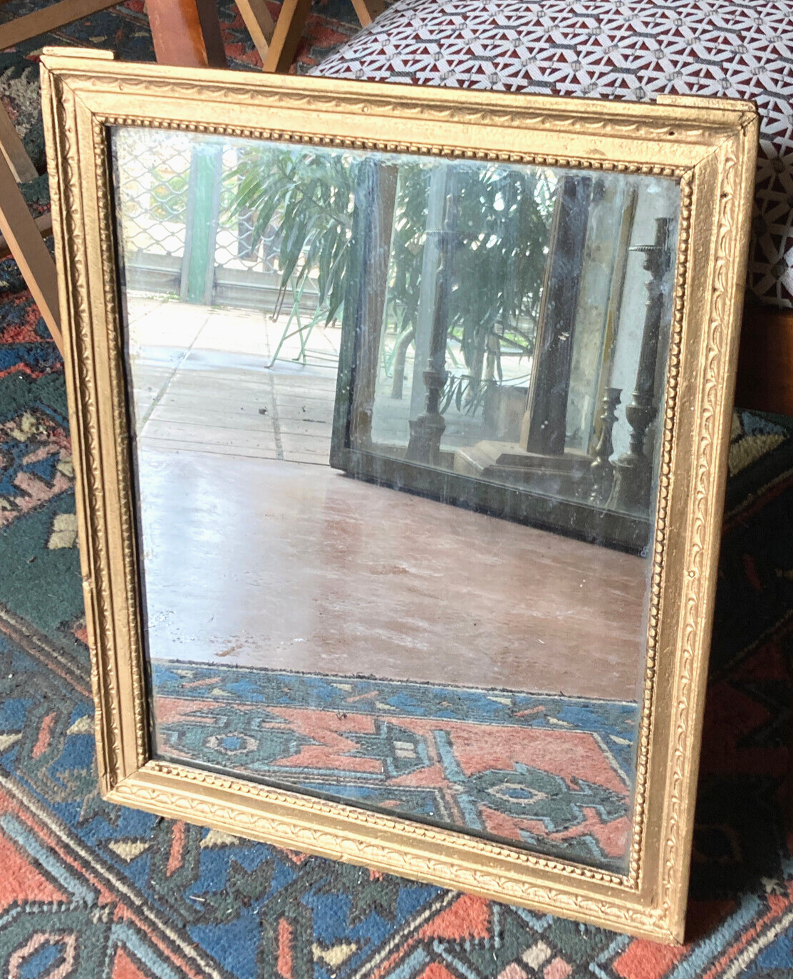 Old rectangular golden mirror baguette with beaded row