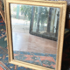 Old rectangular golden mirror baguette with beaded row