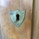 Front of old double door walnut cabinet