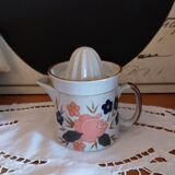 Lemon squeezer and its vintage ceramic pot