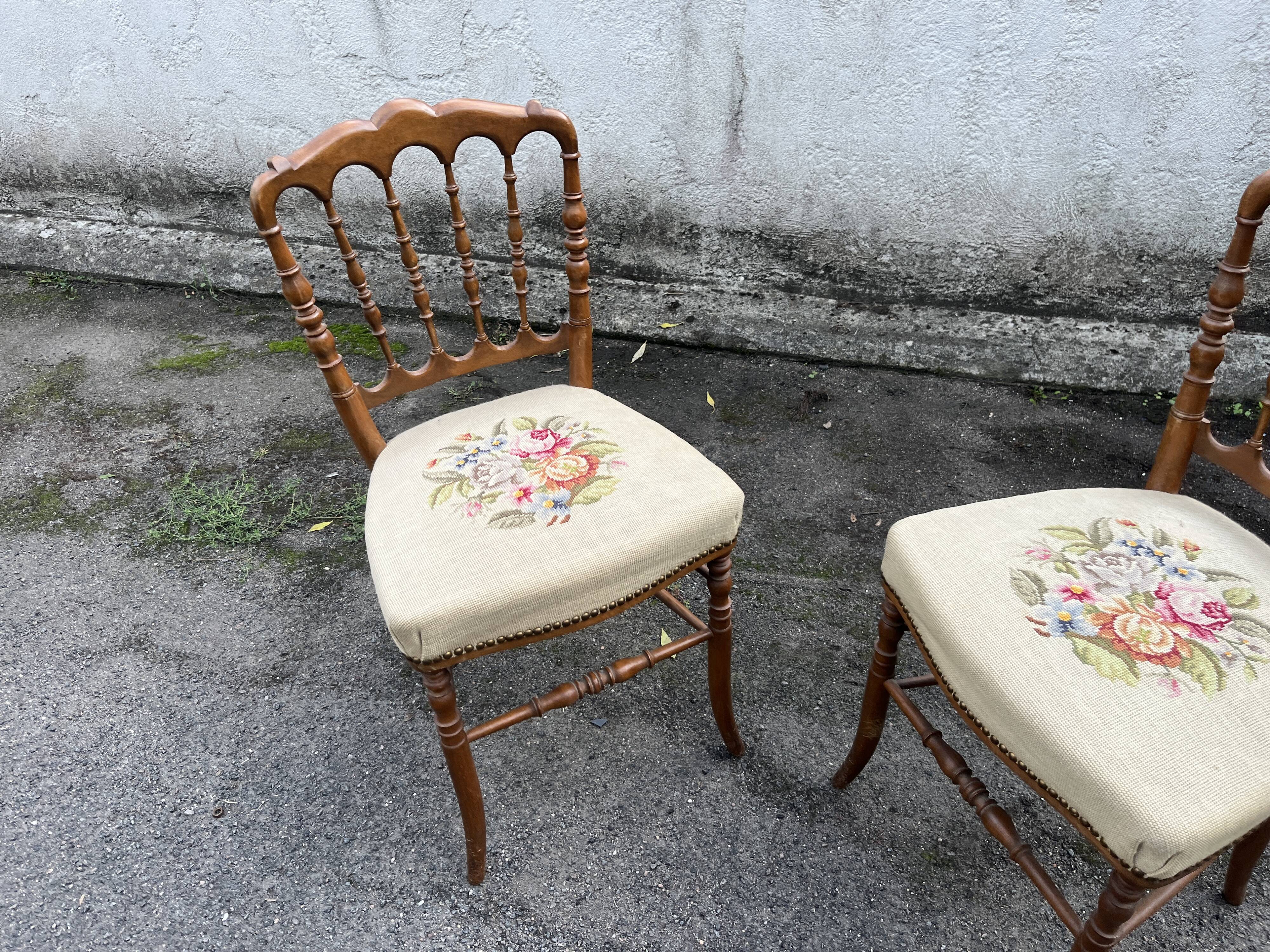Pair of antique turned wooden chairs, embroidered upholstered seats