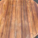 Louis Philippe round table with leaves, solid wood, 19th century, 95cm.