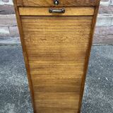 Sliding curtain binder cabinet