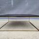 Table basse en marbre noir et laiton