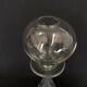 Glass oil lamp blows on foot shower