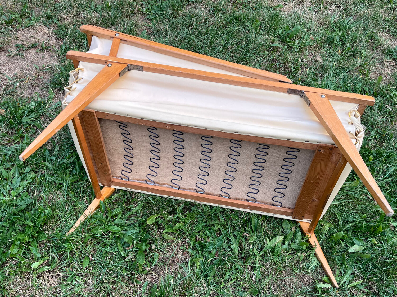 Wooden designer travel cot