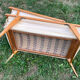 Wooden designer travel cot