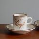 2 coffee cups, 80s sandstone subcups