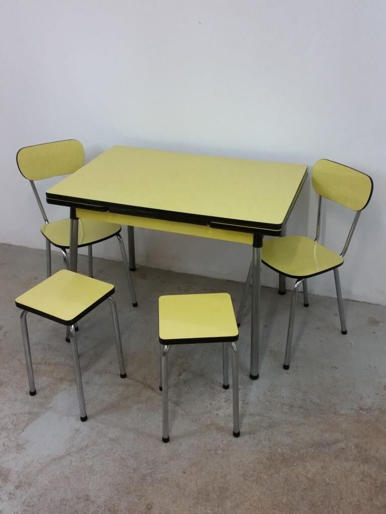 Table and chairs in formica yellow