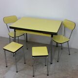Table and chairs in formica yellow