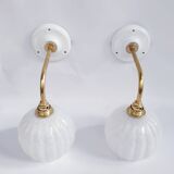 Brass and speckled glass wall lights from Clichy