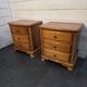 Pair of Louis Philippe style bedside tables in cherry wood.