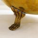 Planter on lion legs, made of golden metal