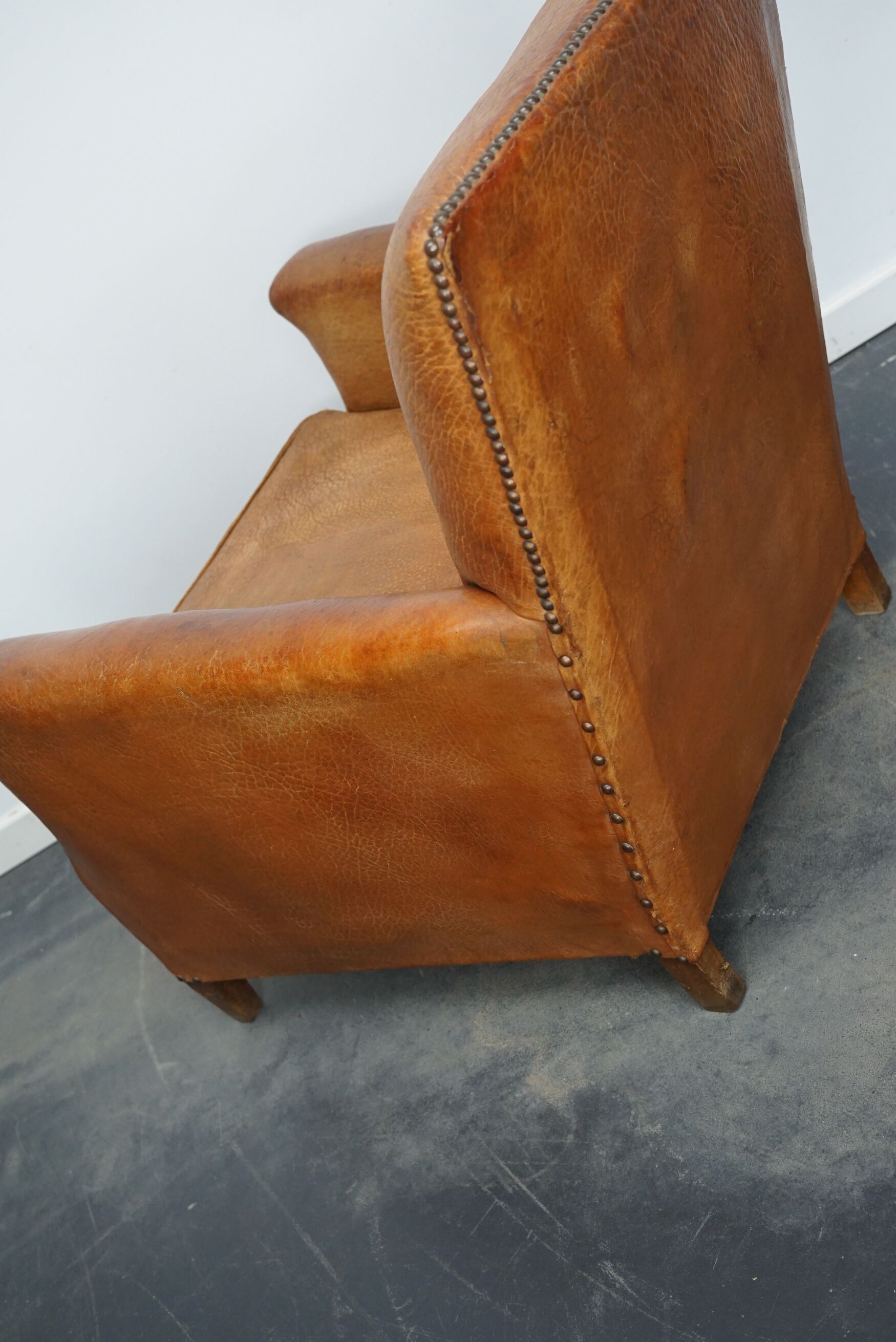 Vintage french cognac-colored leather club chair, 1940s