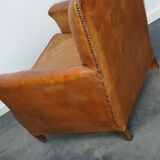 Fauteuil club cognac, années 1940