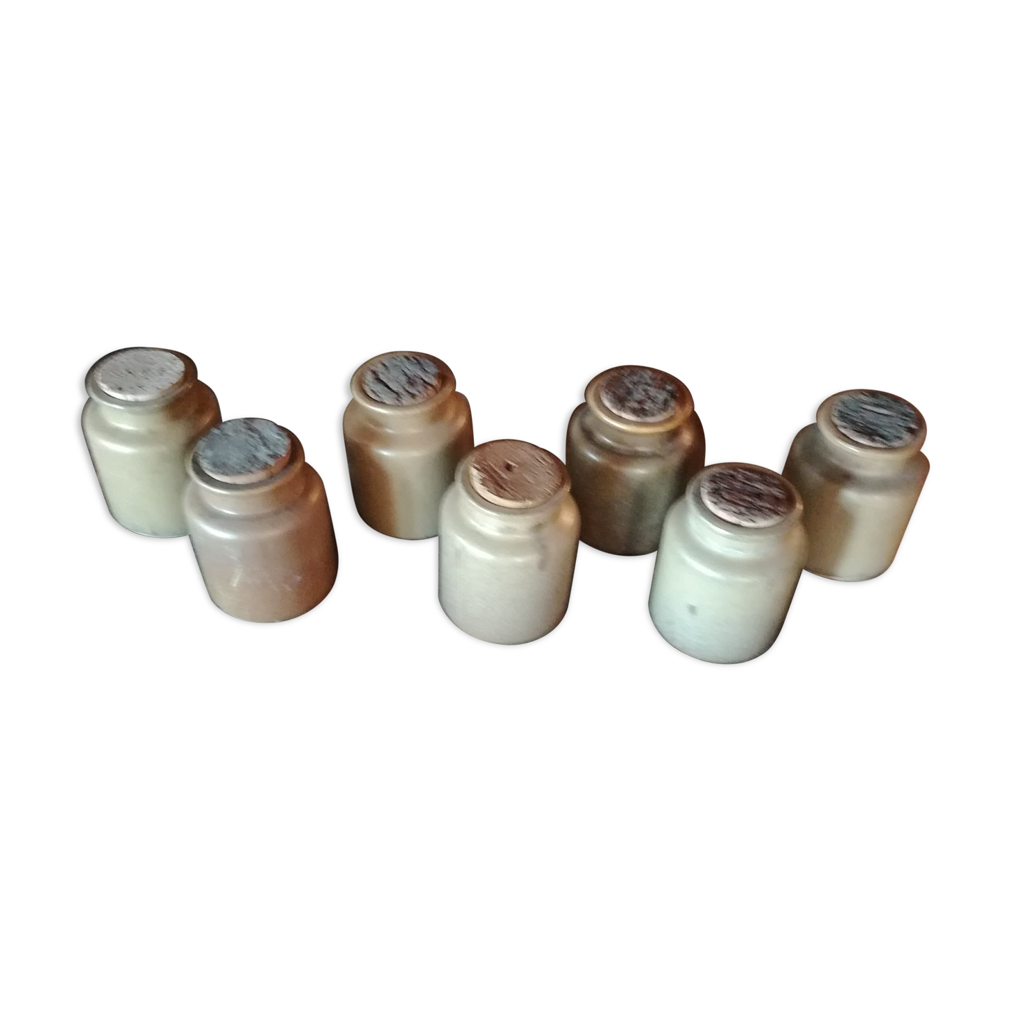 Lot of seven sandstone spice pots