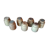 Lot of seven sandstone spice pots