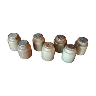 Lot of seven sandstone spice pots