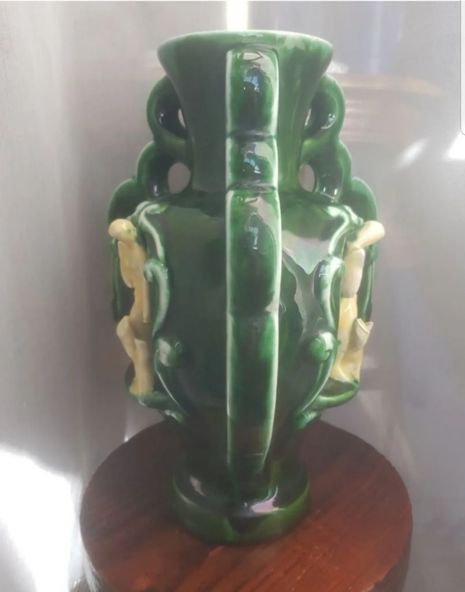 Earthenware vase with 3 caryatids