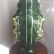 Earthenware vase with 3 caryatids