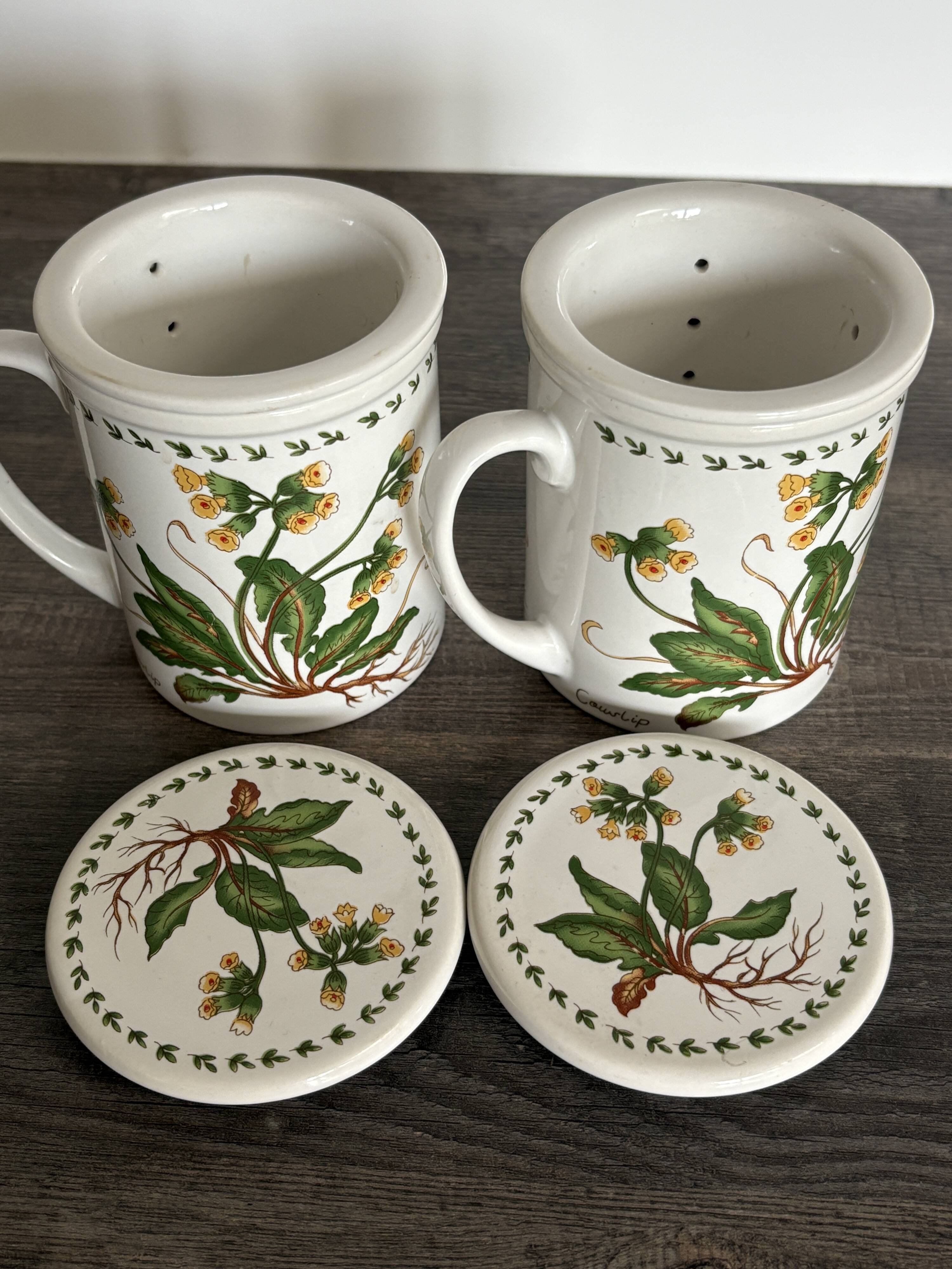 Pair of vintage infusion mugs.