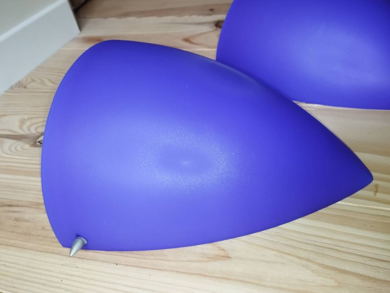 a pair of Ikea Kvintett wall lamps