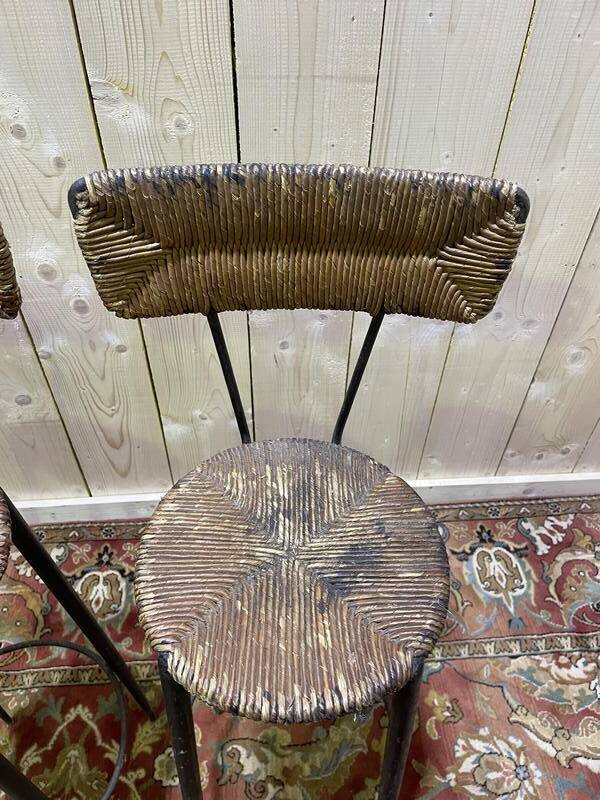 Suite de 3 tabourets de bar en acier et paillés