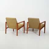 Pair of Danish teak armchairs with green upholstery