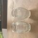 Two hyacinth vases in molded glass with vintage geometric patterns