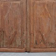 Large 17th century Monastery doors in terracotta lacquered oak, Portugal