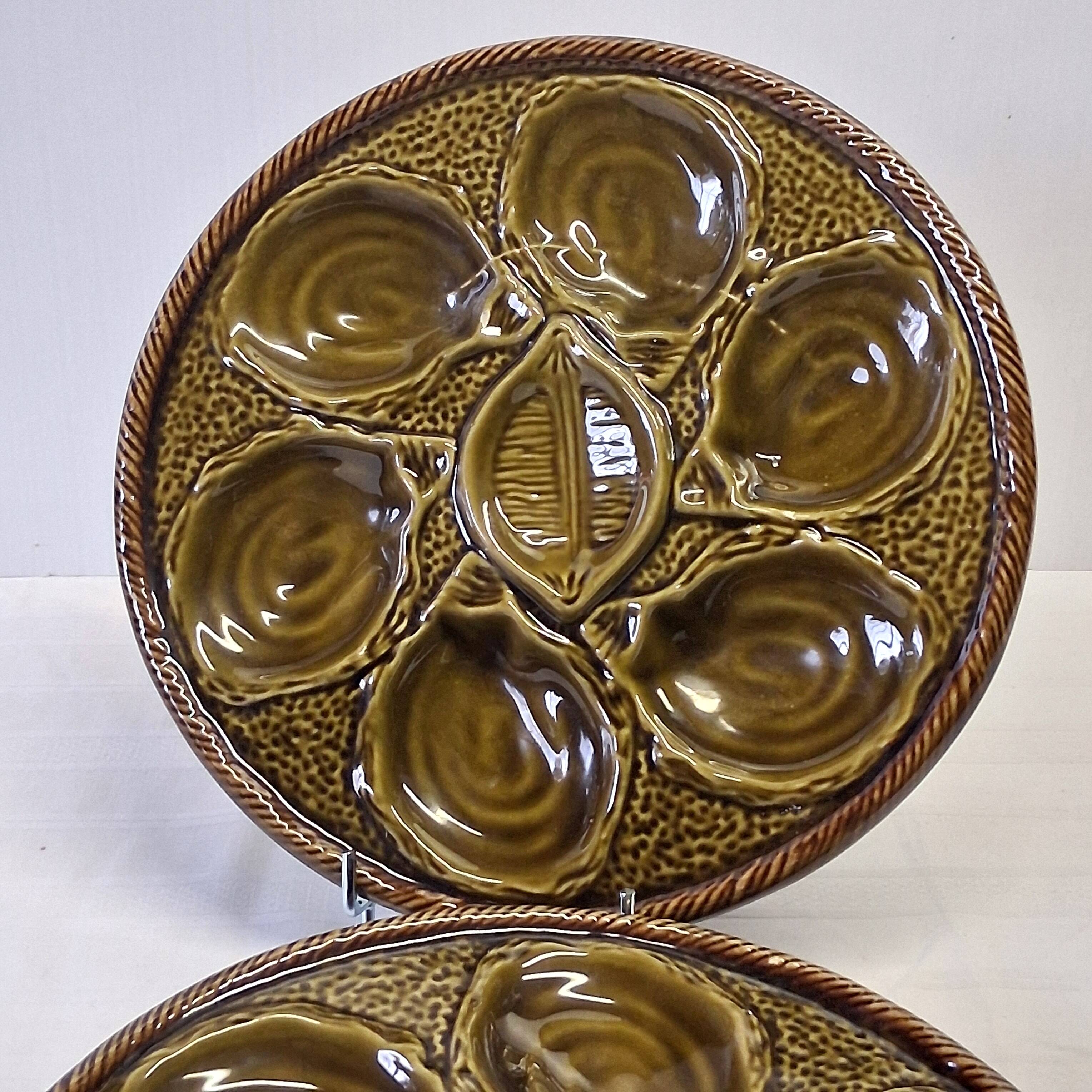 3 green majolica oyster plates from St Clément in good condition.