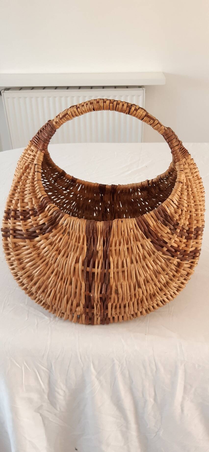 Old banana basket with wicker two colors