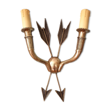 Vintage wall lamp decorated with bronze arrows