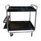 Blackened wooden rolling table