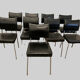 Suite of nine vintage chairs in chrome and imitation leather XX century
