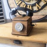 Old wooden dial crank telephone