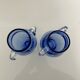 Paire de vases en verre bleu glacier