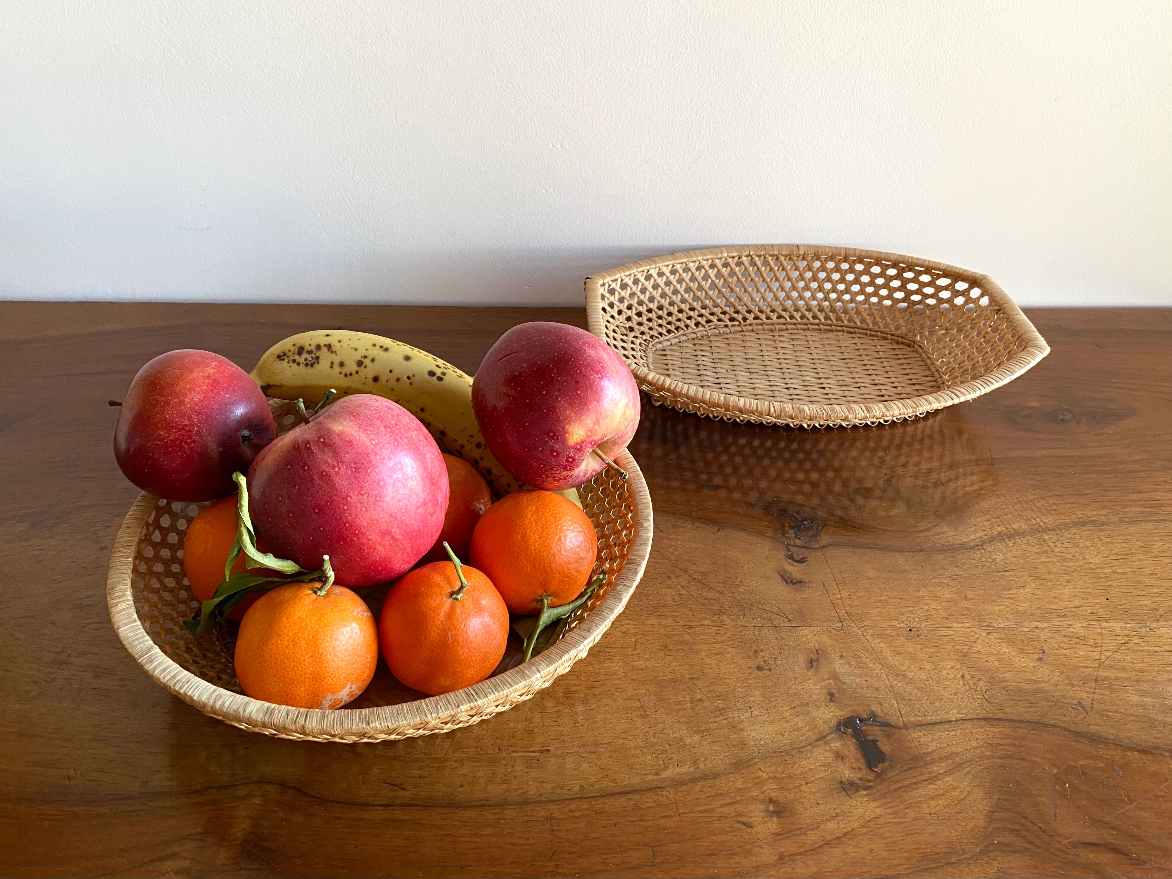 Pair of vintage braided rattan baskets