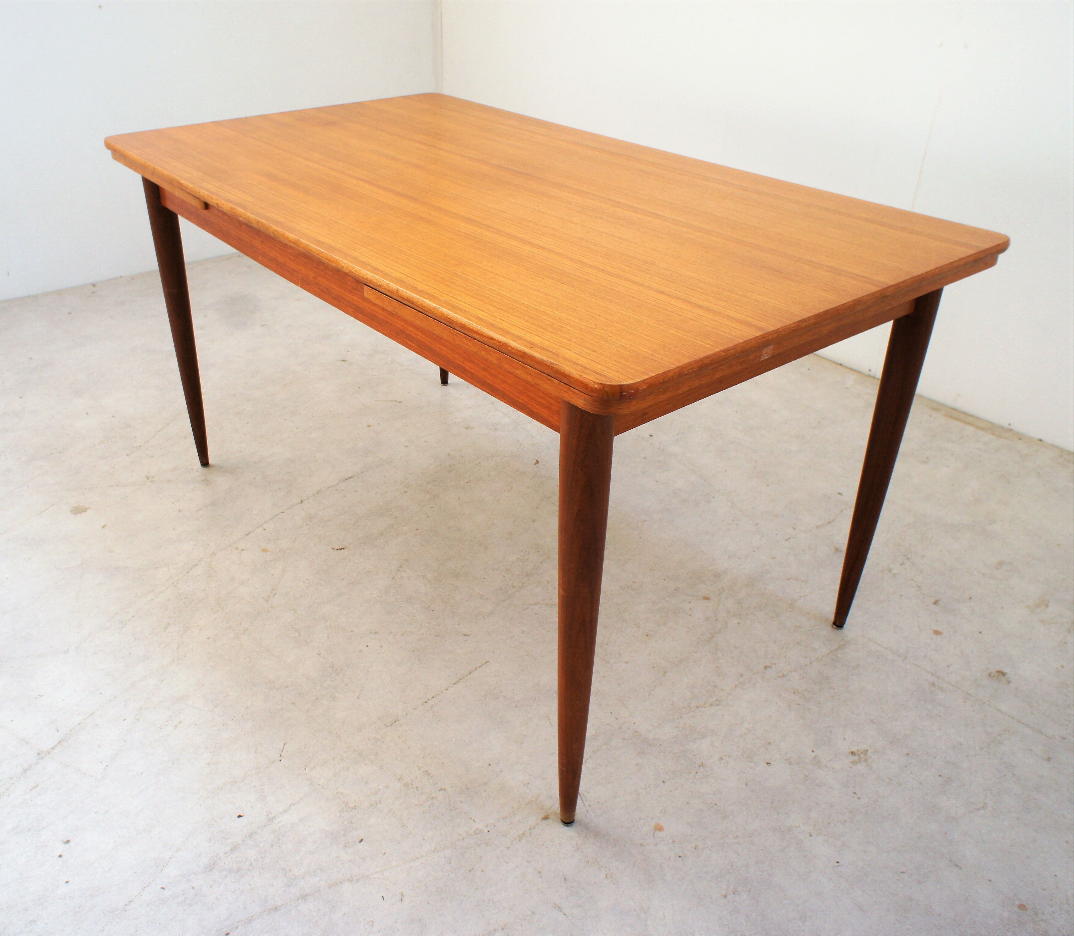 Teak dining table