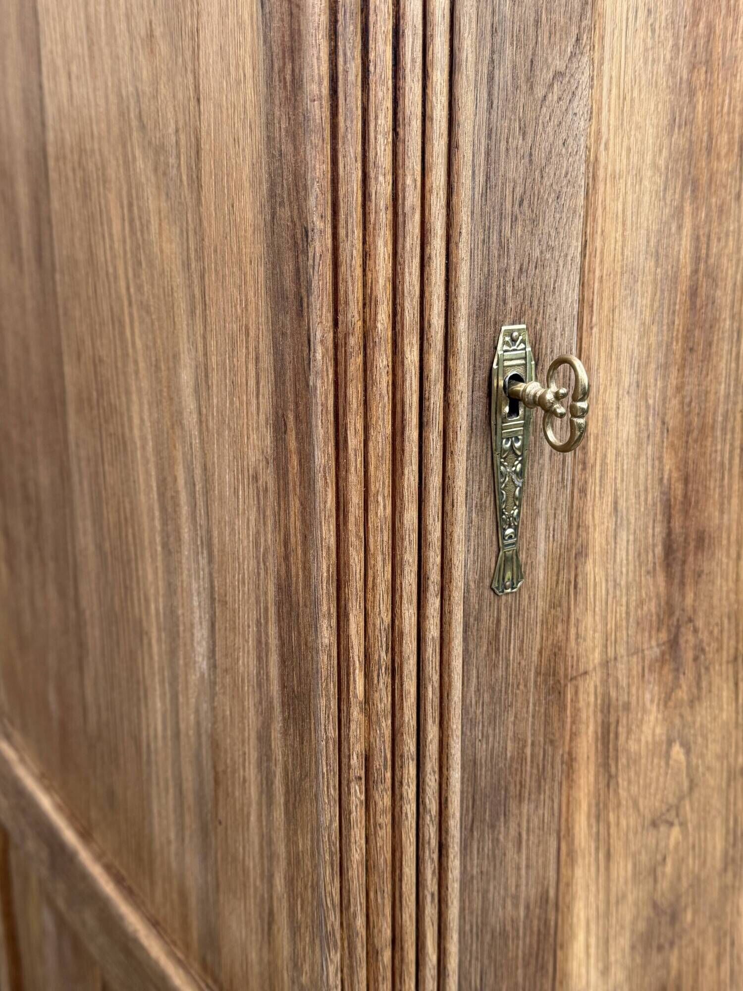 Art Deco bonnetière wardrobe from Paris in raw and solid oak.