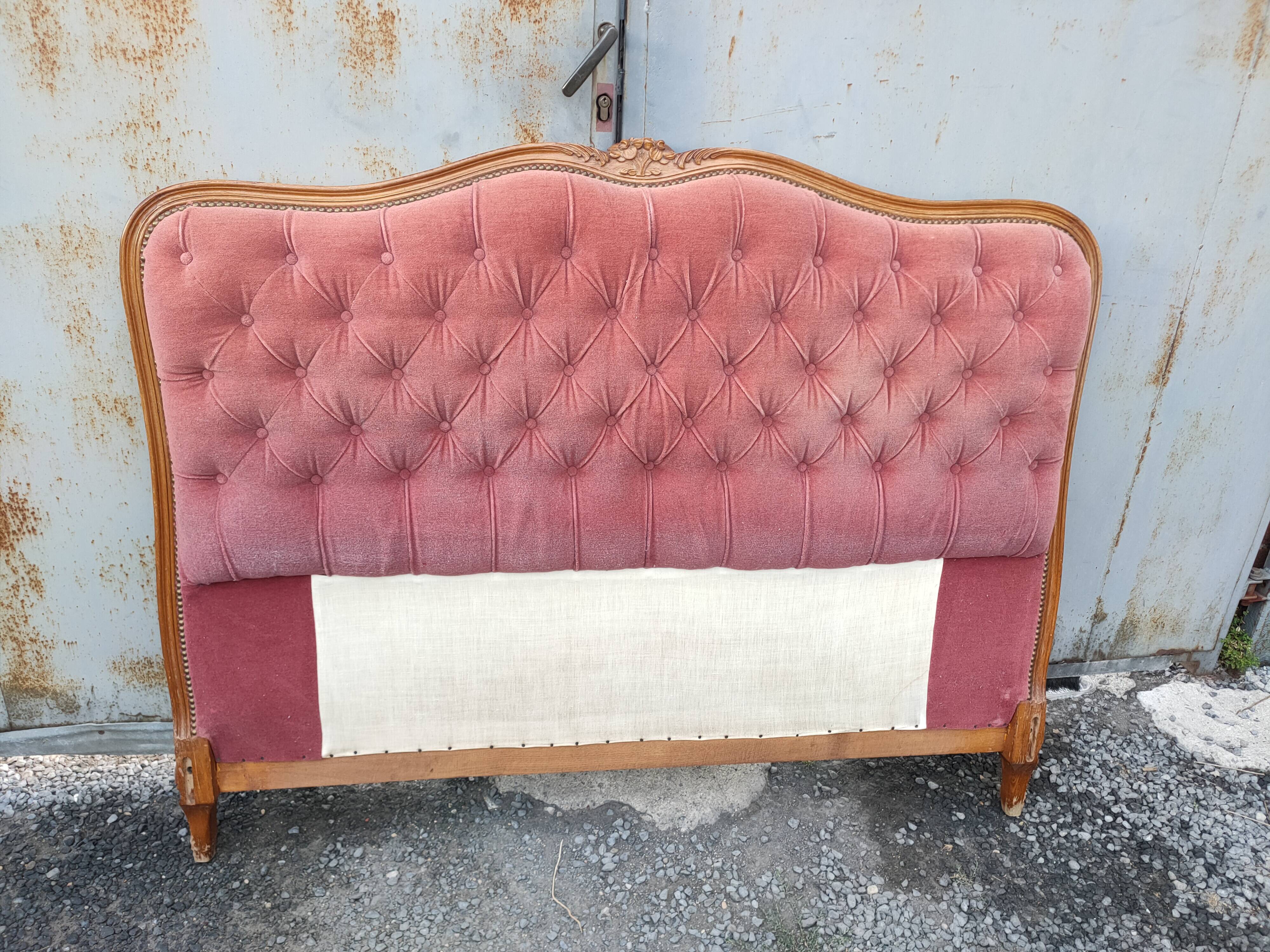 antique wooden and fabric headboard
