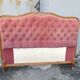 antique wooden and fabric headboard