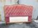 antique wooden and fabric headboard