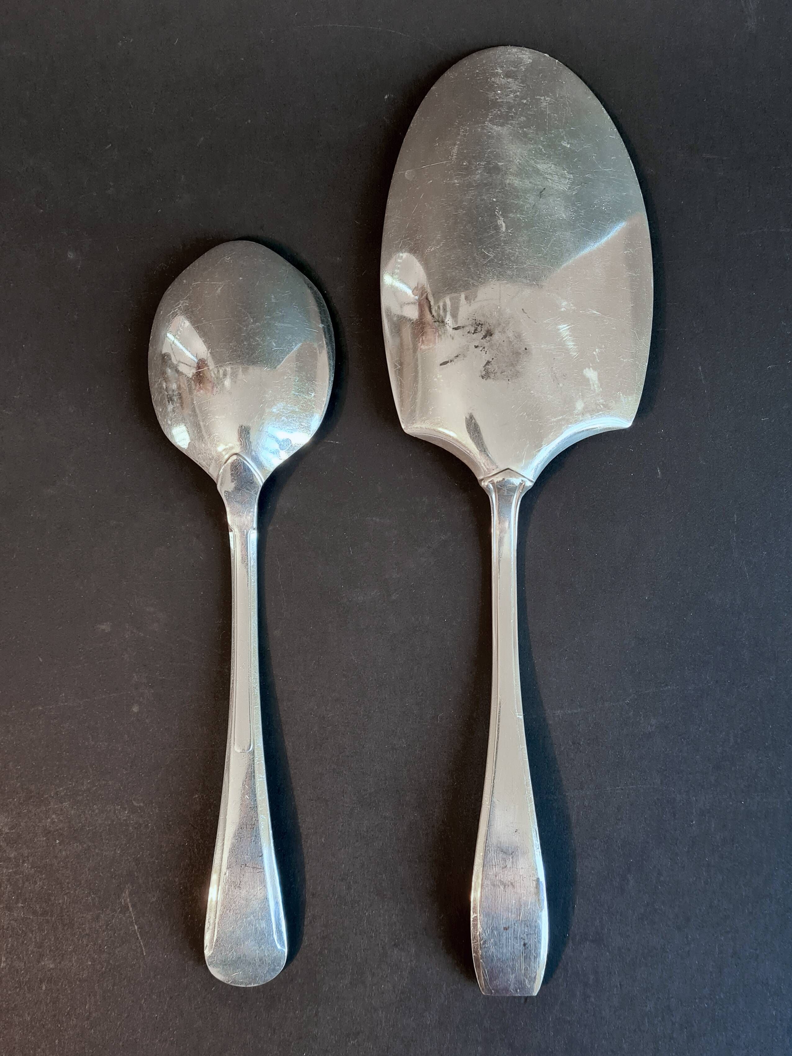 Silver-plated metal serving spoon and French fry shovel signed "Wiskmann"