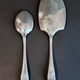 Silver-plated metal serving spoon and French fry shovel signed "Wiskmann"